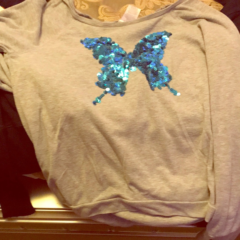 grey sweatshirt with butterfly design